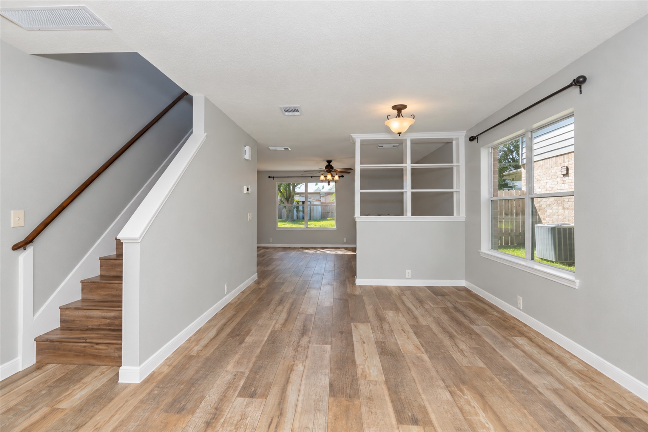 Stairwell and Formal Living/Dining Area Stairwell and Formal Living/Dining Area