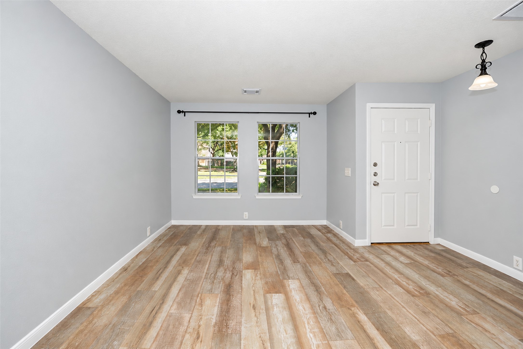 Upon entering you find the Formal Living/Dining Area Upon entering you find the Formal Living/Dining Area