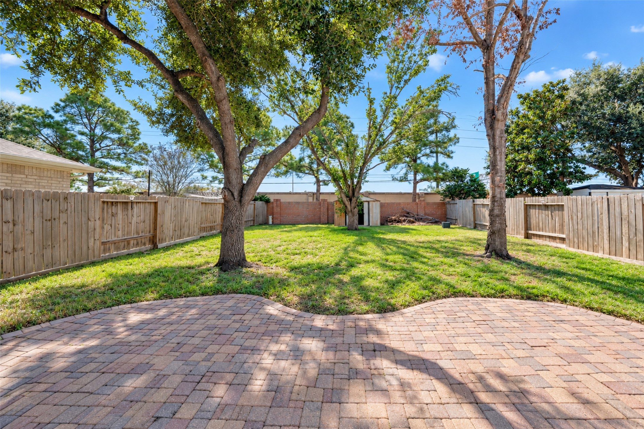Large backyard with shade