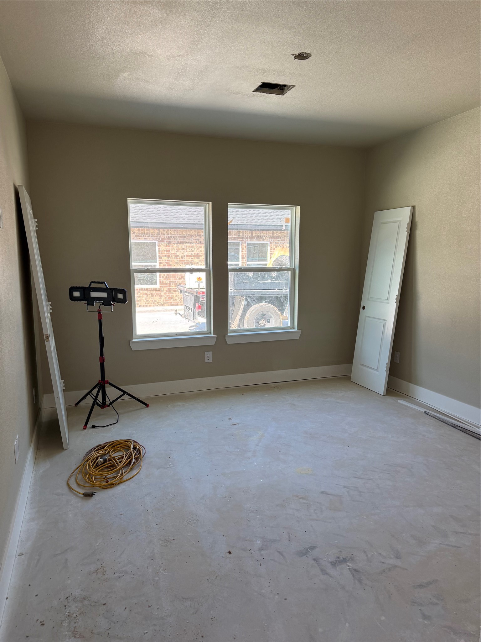 Large Primary bedroom with 2 large windows