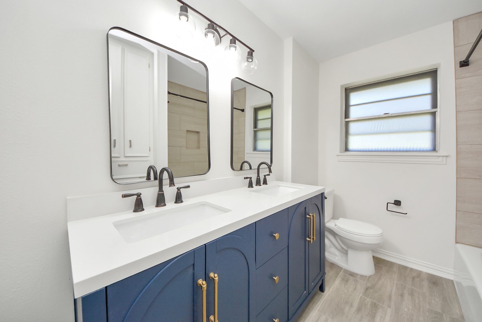 Secondary bathroom is located in between the secondary bedrooms.