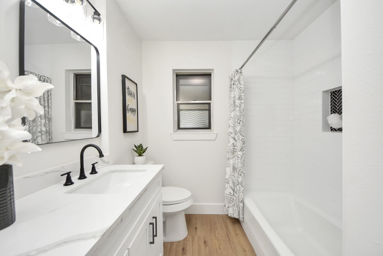 Primary bathroom with all new quartz and cabinets. Getting ready is a breeze with a double vanity!