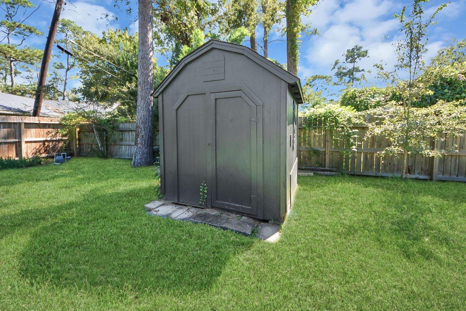Storage shed with fresh paint.
