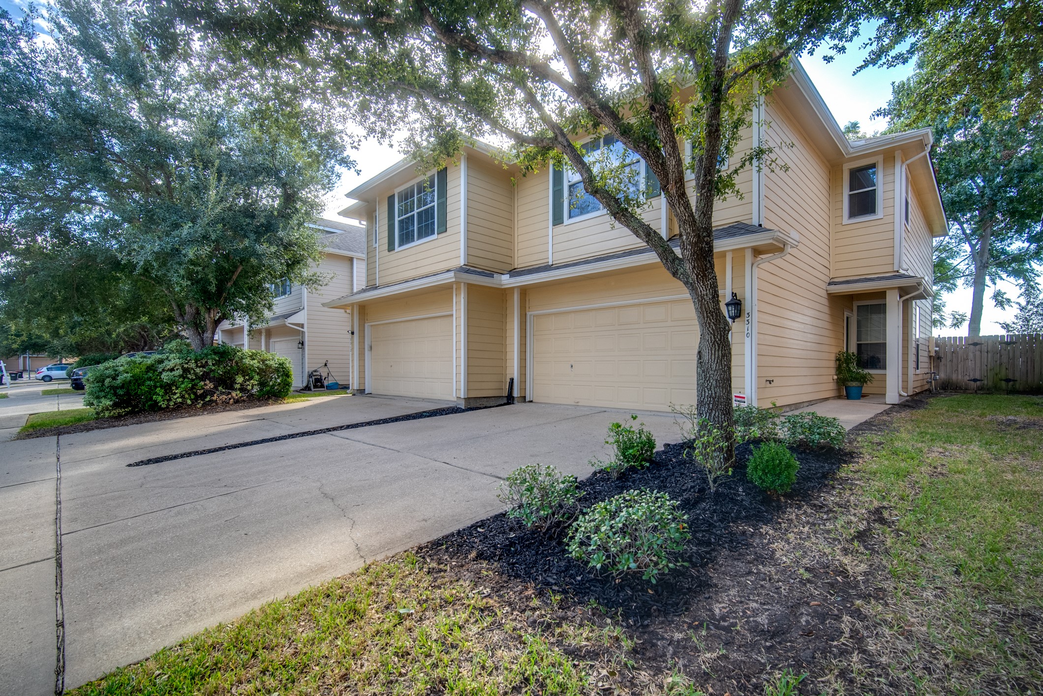 Long double driveway with 2 car garage