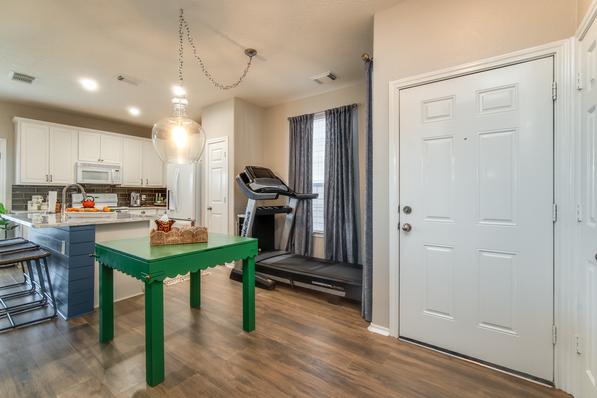 View of the foyer and the dining and kitchen area