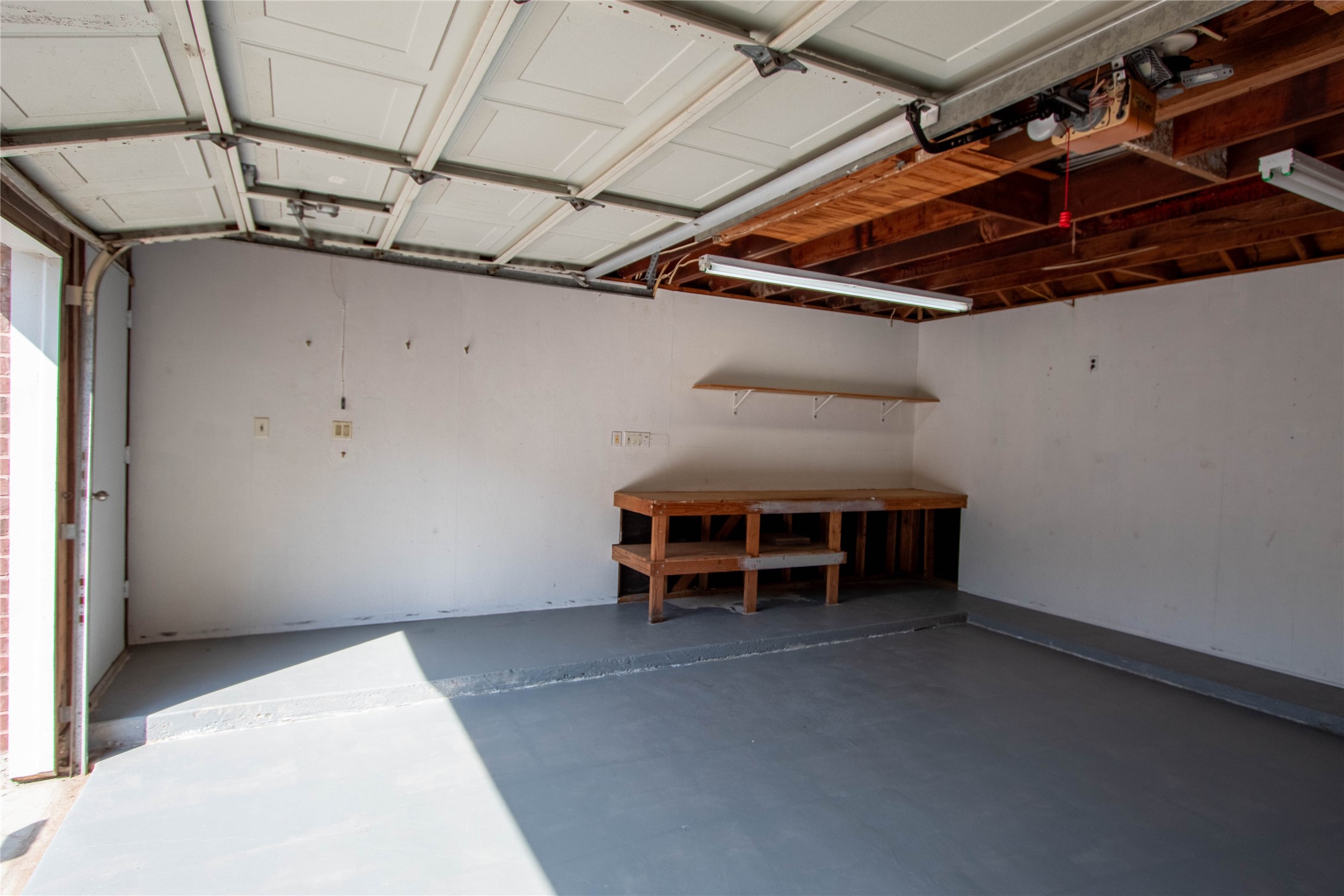 Built-in worktable and plenty of room for a refri/freeze or just extra storage.