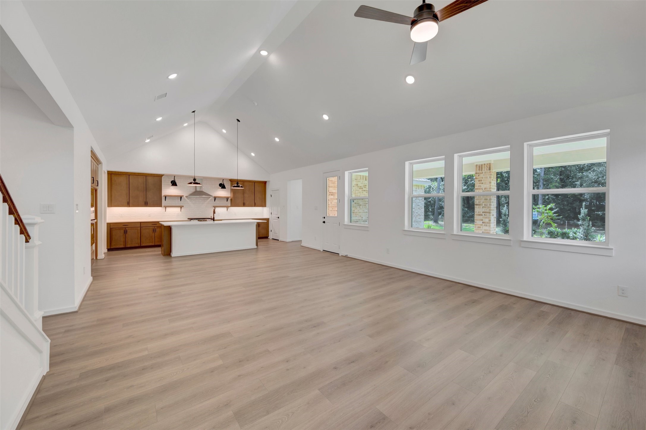 Open living area (*Photo not of actual home and used for illustration purposes only. Colors/finishes may differ from the ones currently selected in the home.)