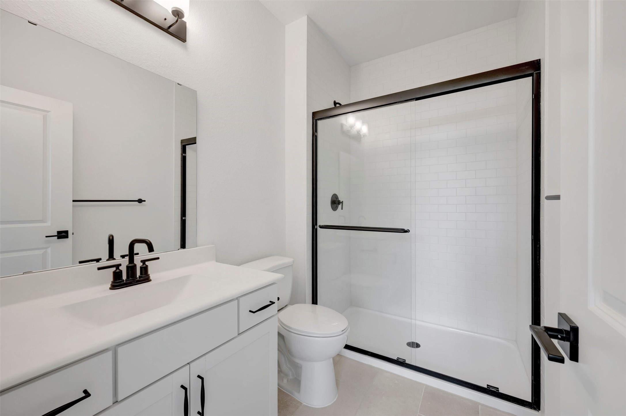 Extra Suite bath (*Photo not of actual home and used for illustration purposes only. Colors/finishes may differ from the ones currently selected in the home.)