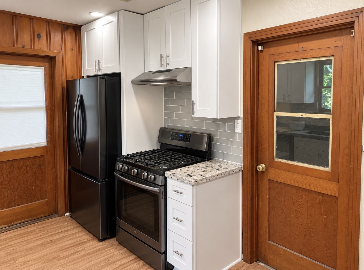 Updated finishes complement the original woodwork