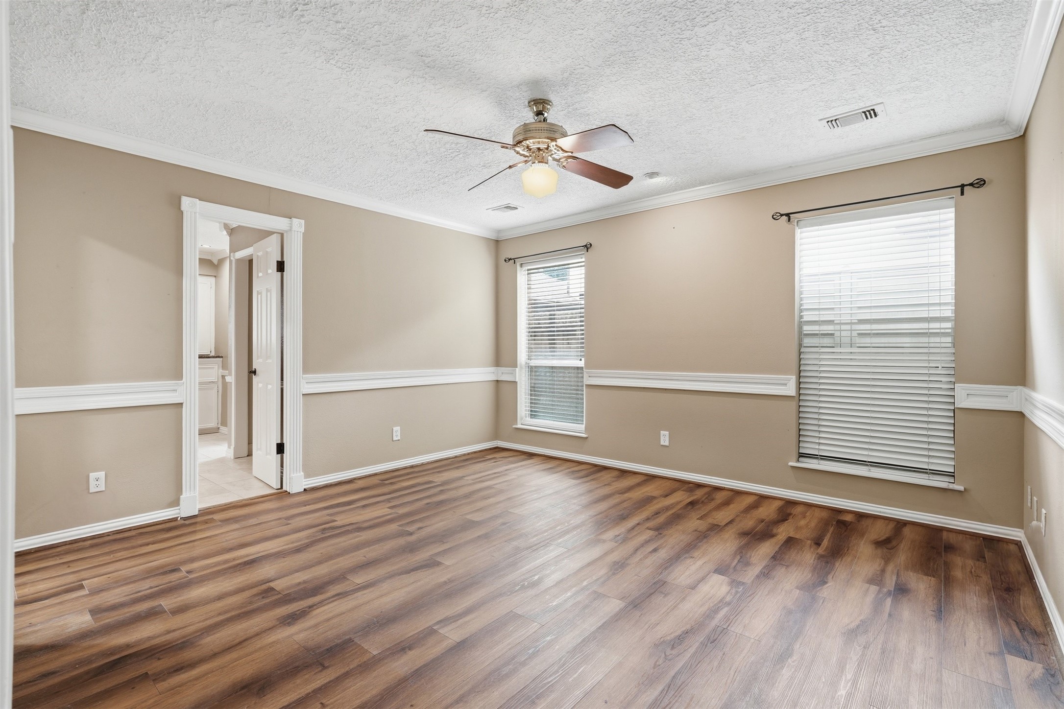 Escape to the spacious primary suite, offering a peaceful retreat with plenty of room to relax.
