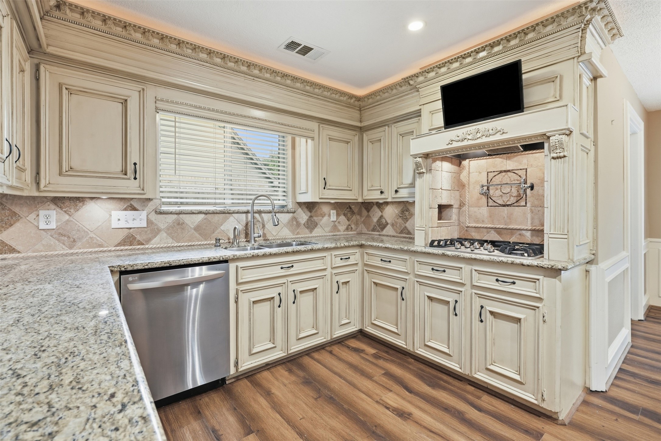 Enjoy preparing meals while remaining connected to the adjacent living and breakfast areas.