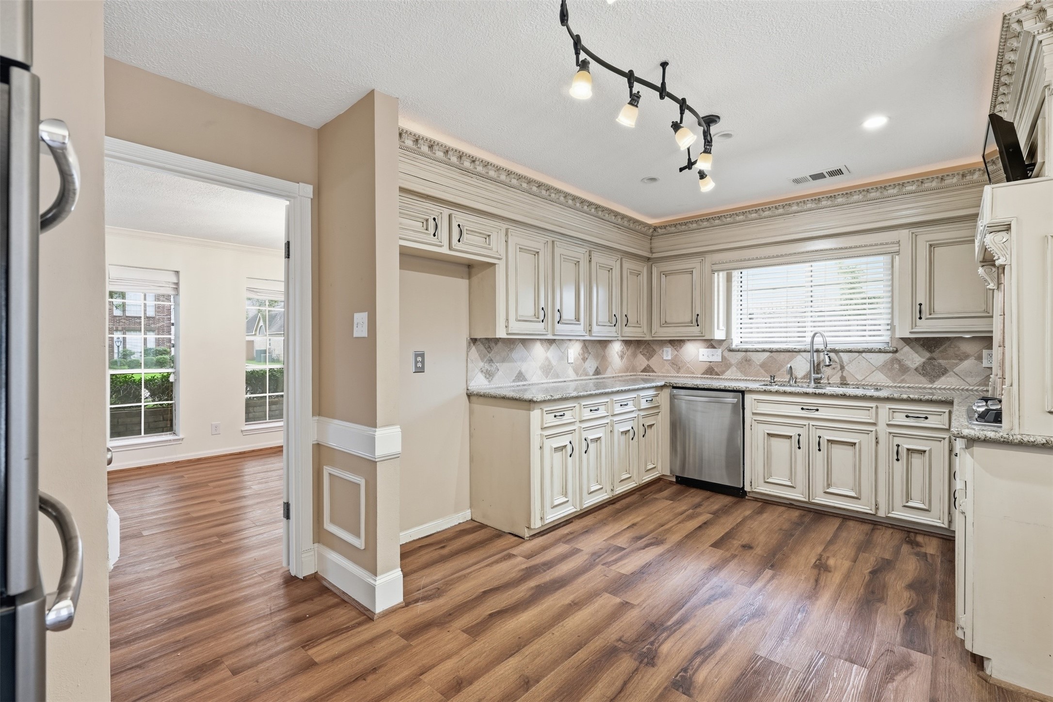 Thoughtfully designed with ample workspace and storage, this kitchen is ready for gatherings of every size.
