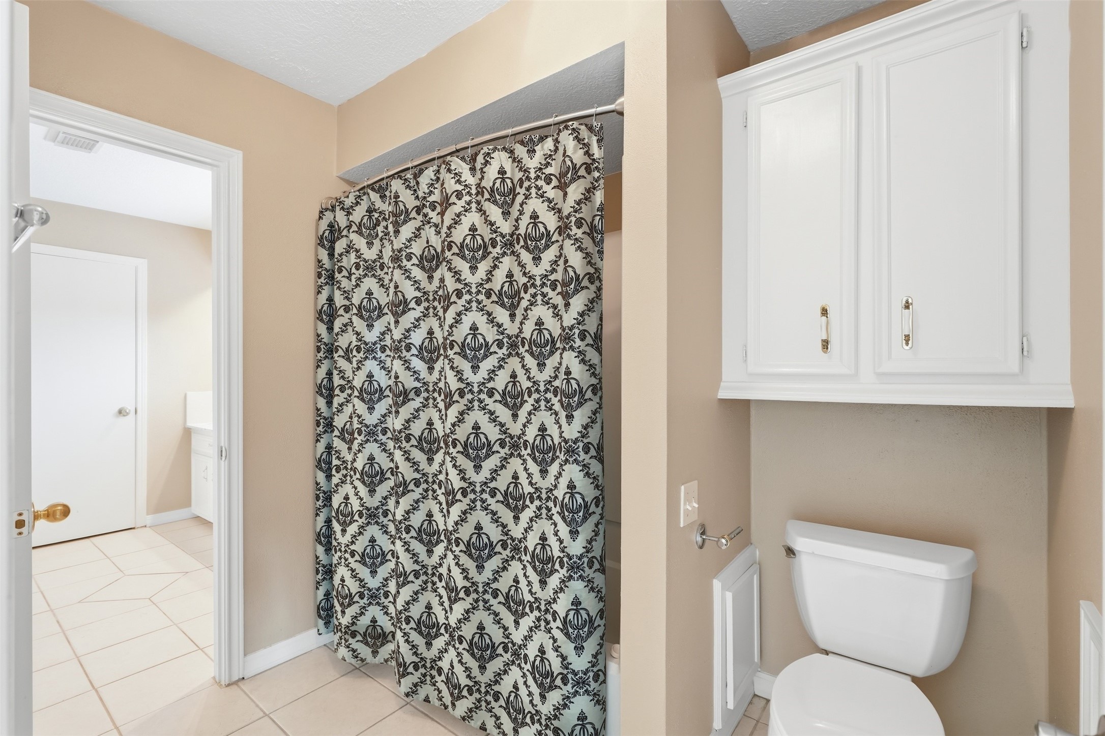 This room connect to the upstairs bathroom vanity with dual sinks. This room of the bathroom also connects to one of the secondary bedrooms upstairs.