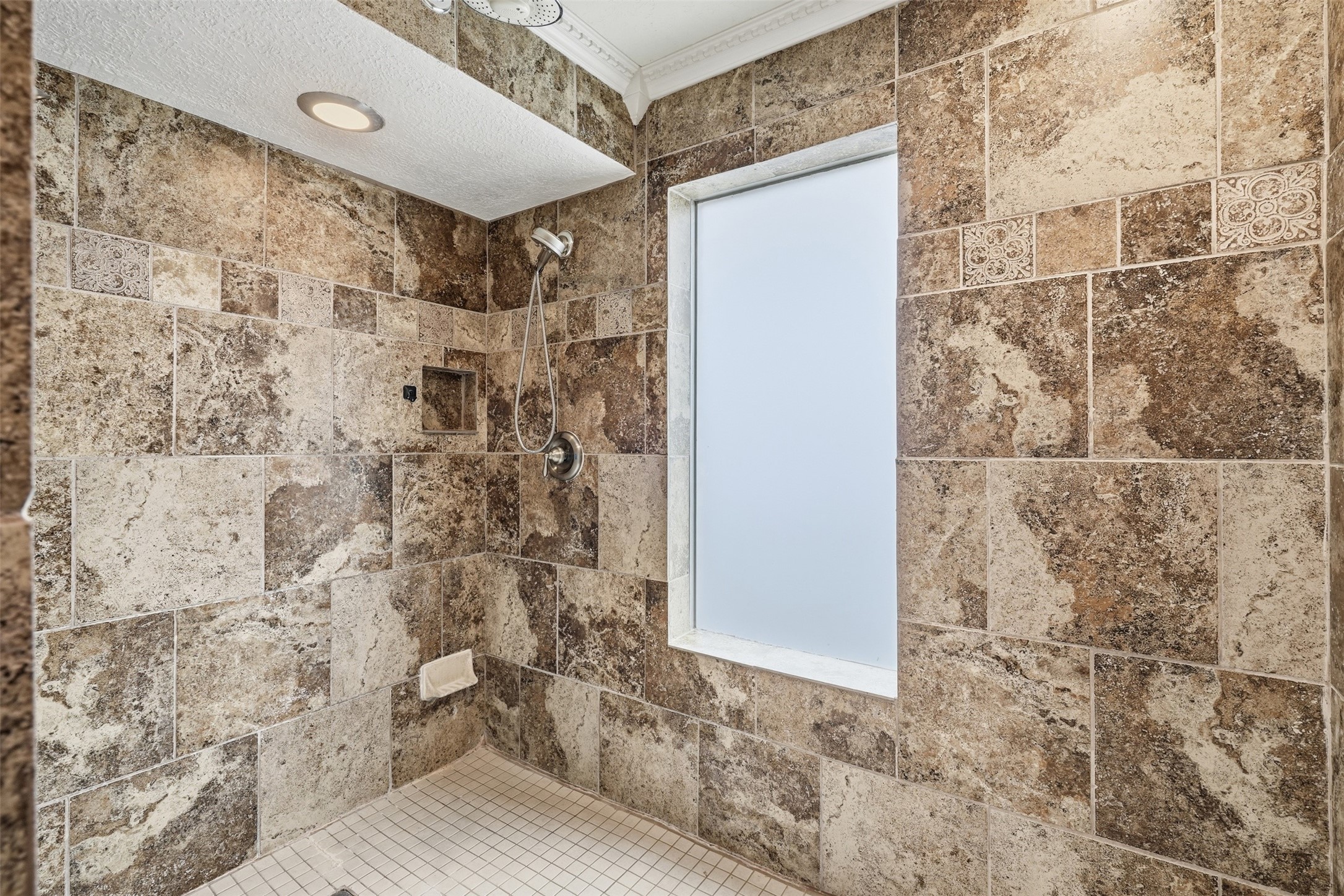 Enjoy the oversized walk-in shower, creating a spa-like experience within your own home.