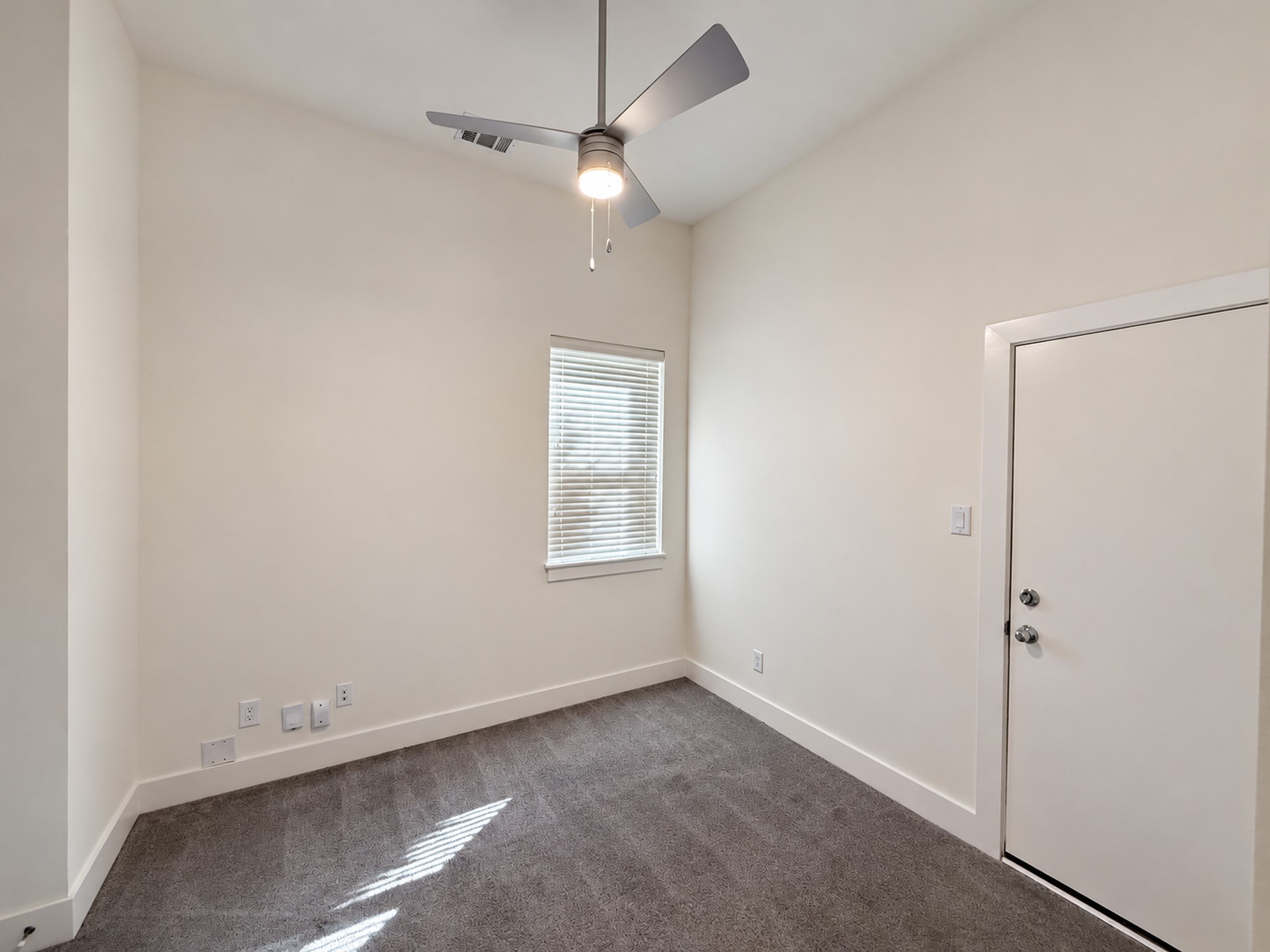 Private downstairs bedroom suite with its own exterior entrance for added convenience.