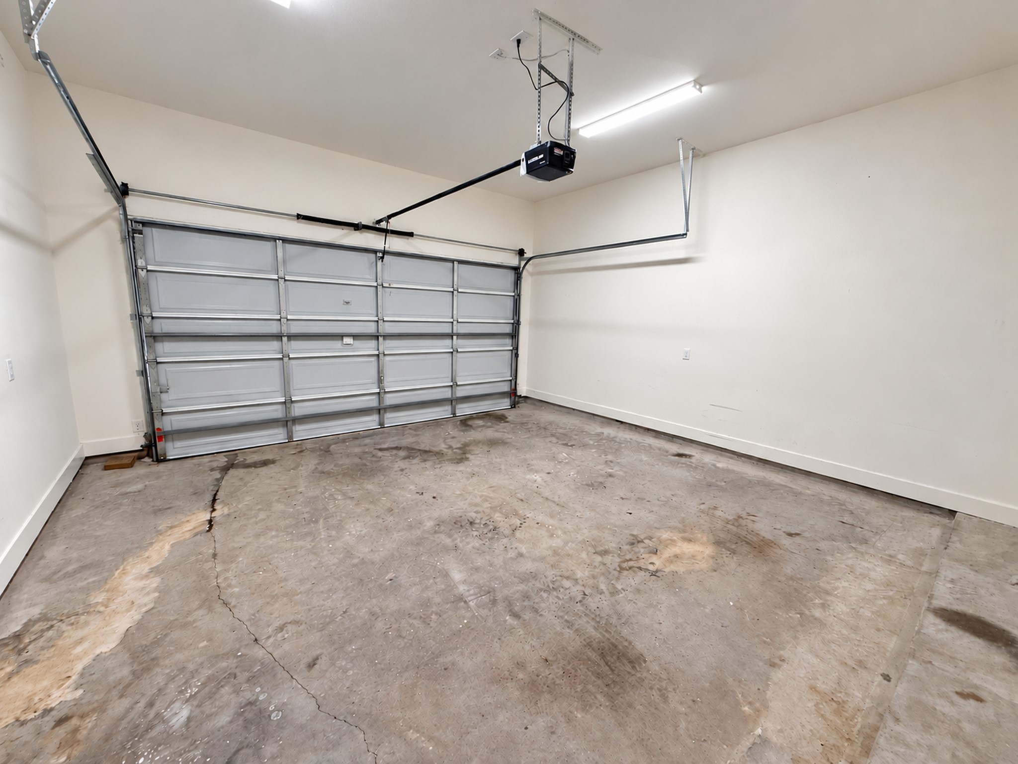 Attached two-car garage offering convenient parking and additional storage space.