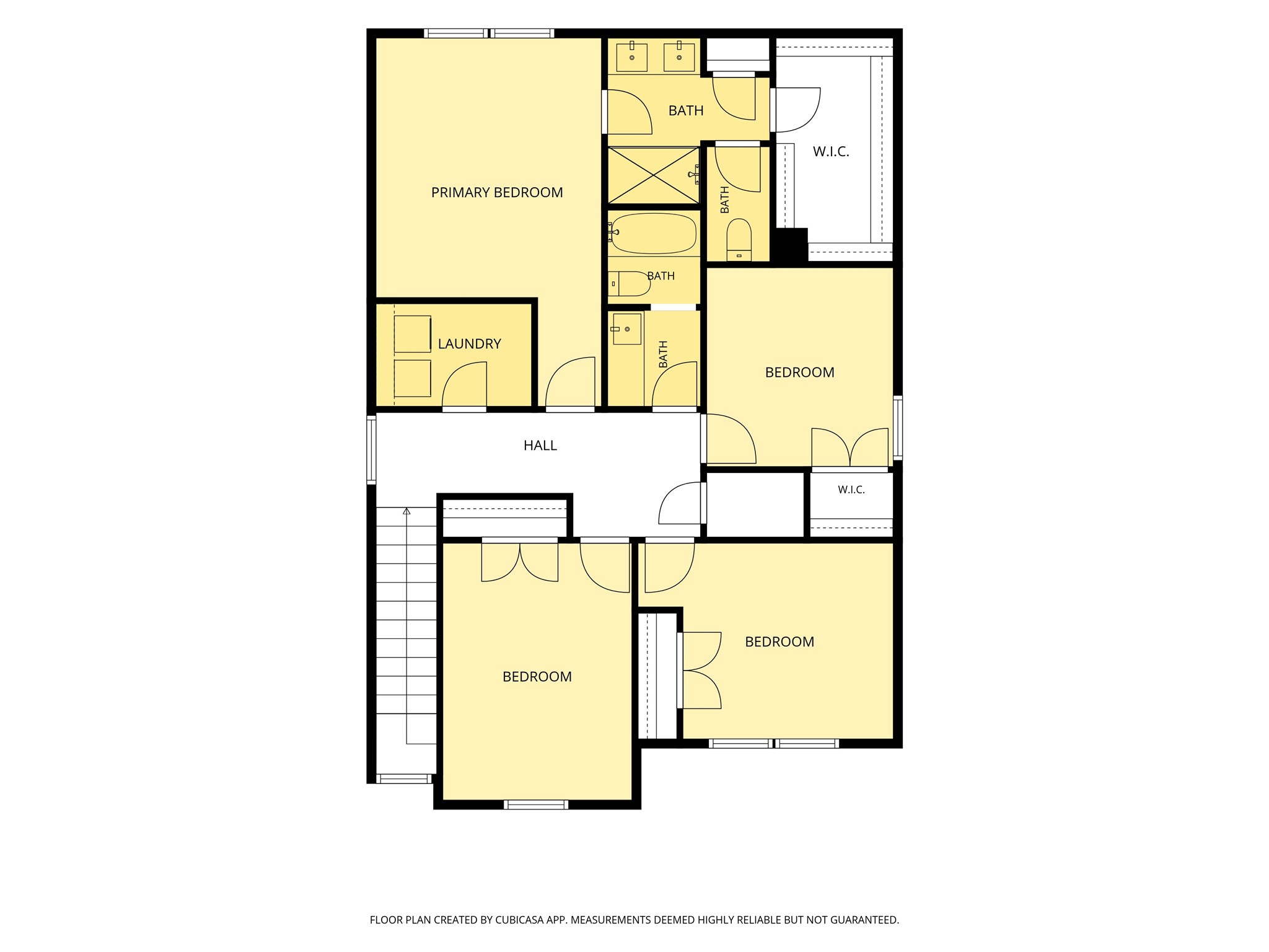 Spacious upper level featuring a primary bedroom with en-suite bath and walk-in closet, three additional bedrooms, two more bathrooms, and a convenient laundry room.