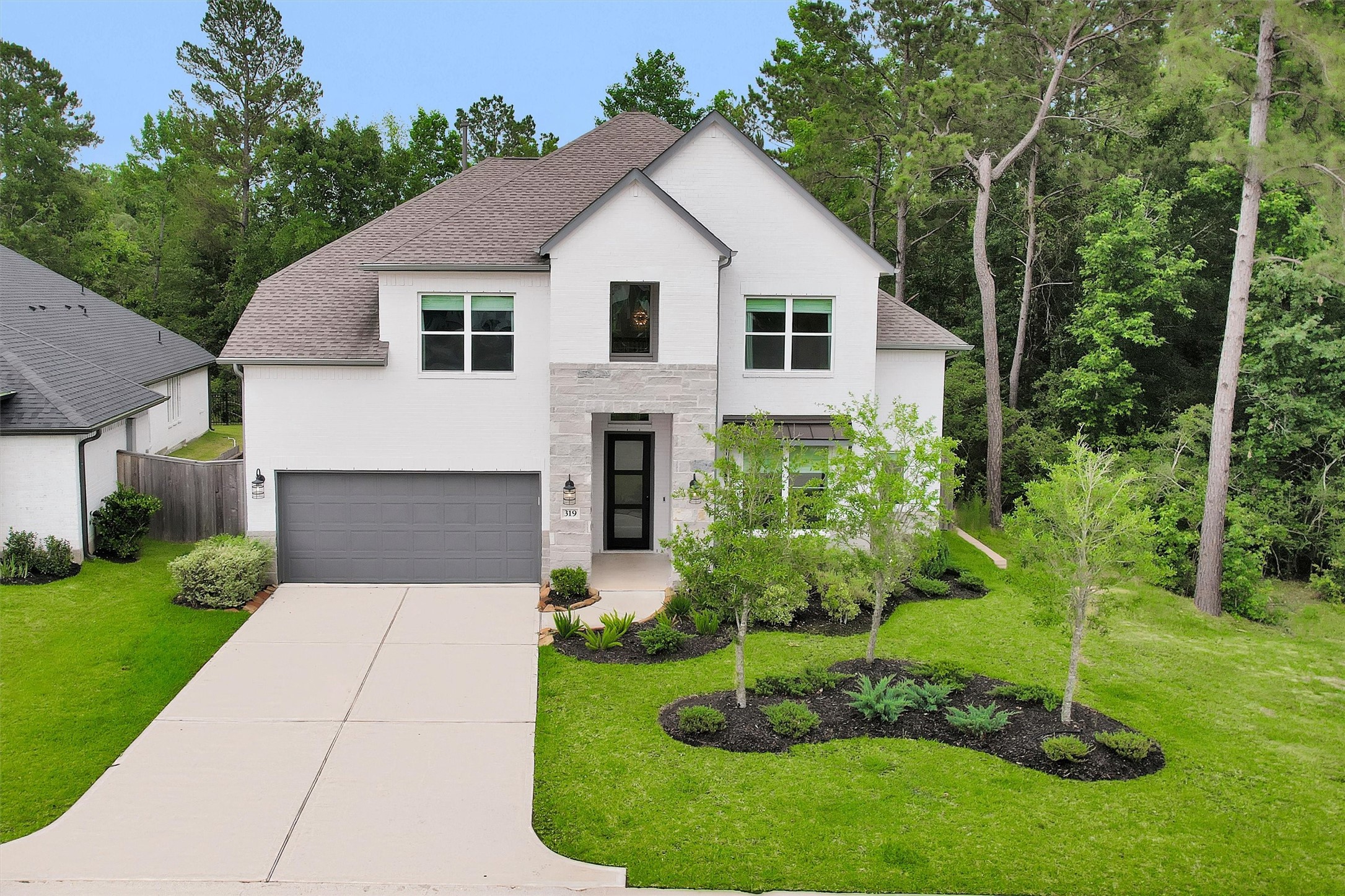 Stunning exterior elevation with incredible curb appeal, perfectly positioned on a premium lot with no back or side neighbors in Woodforest. Stunning exterior elevation with incredible curb appeal, perfectly positioned on a premium lot with no back or side neighbors in Woodforest.