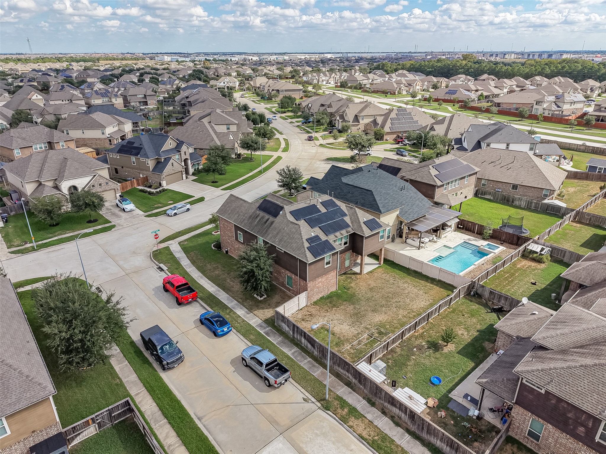 Charming suburban neighborhood featuring spacious homes with well-maintained yards and private pools, ideal for family living.
