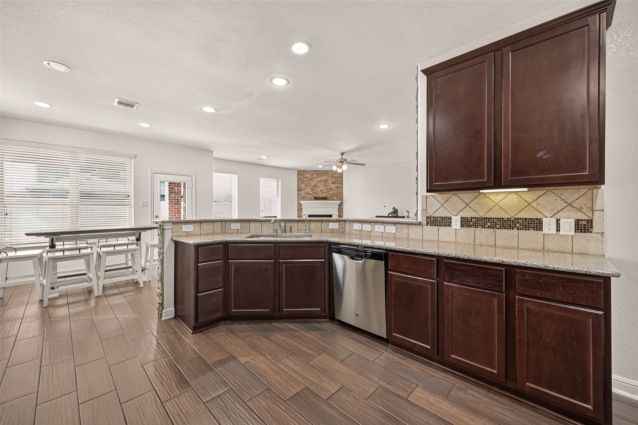 Another perspective of the spacious kitchen and breakfast room, thoughtfully designed for everyday comfort and casual dining.