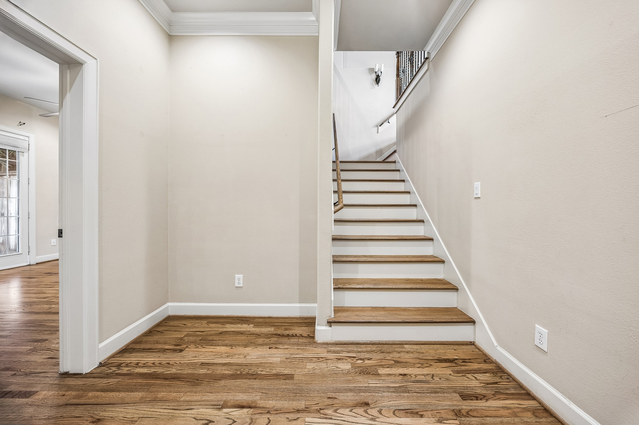 Entry way - all wood floors.  No carpet in home.