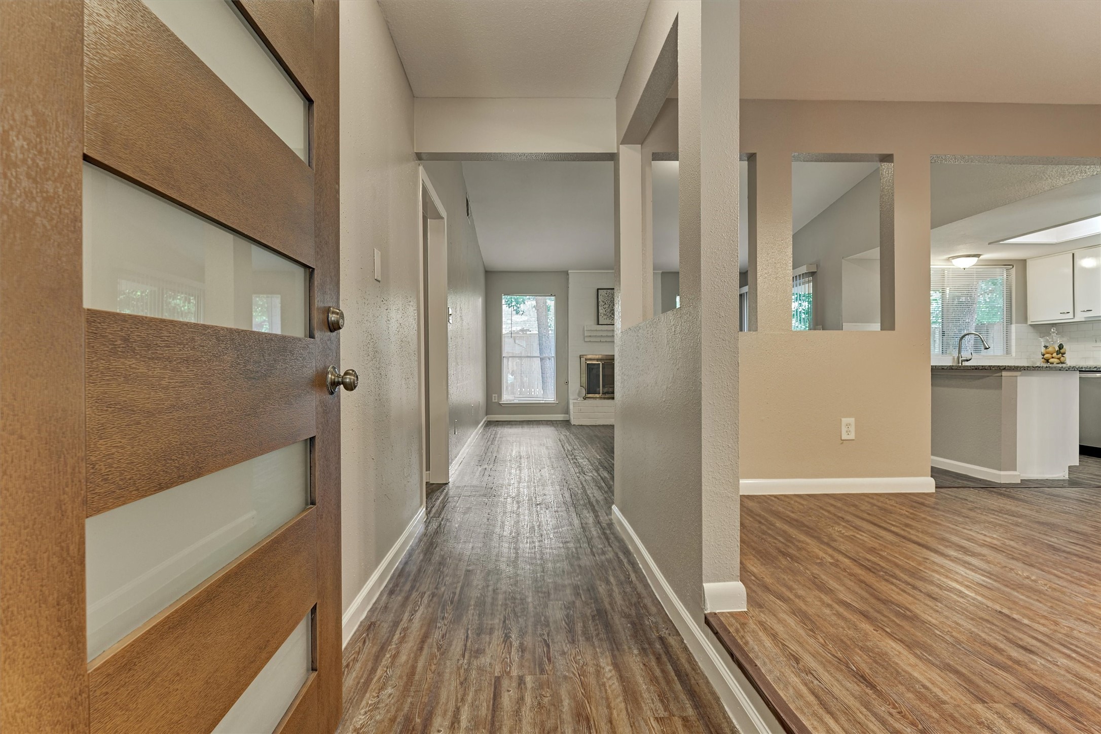 Step inside where you will find vinyl flooring throughout the main living areas.  The dining room is on the right.