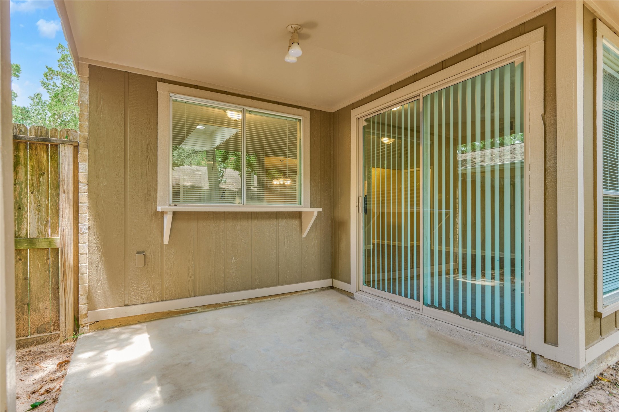 Enjoy barbecuing on the covered porch.  You can pass through items to the cook from the kitchen window!