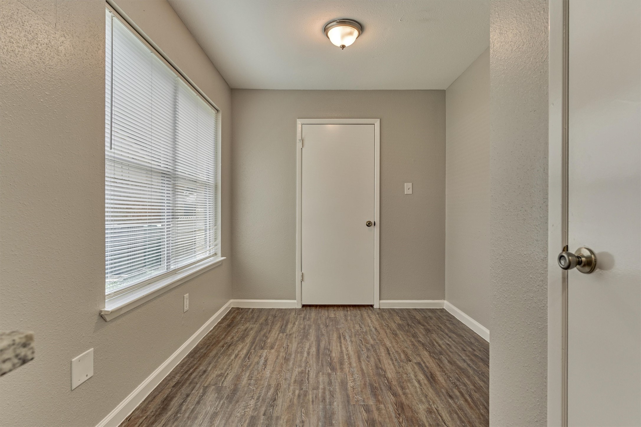 The breakfast area has room for a small table and chairs.  This area could also be used as a drop zone when entering from the laundry room.