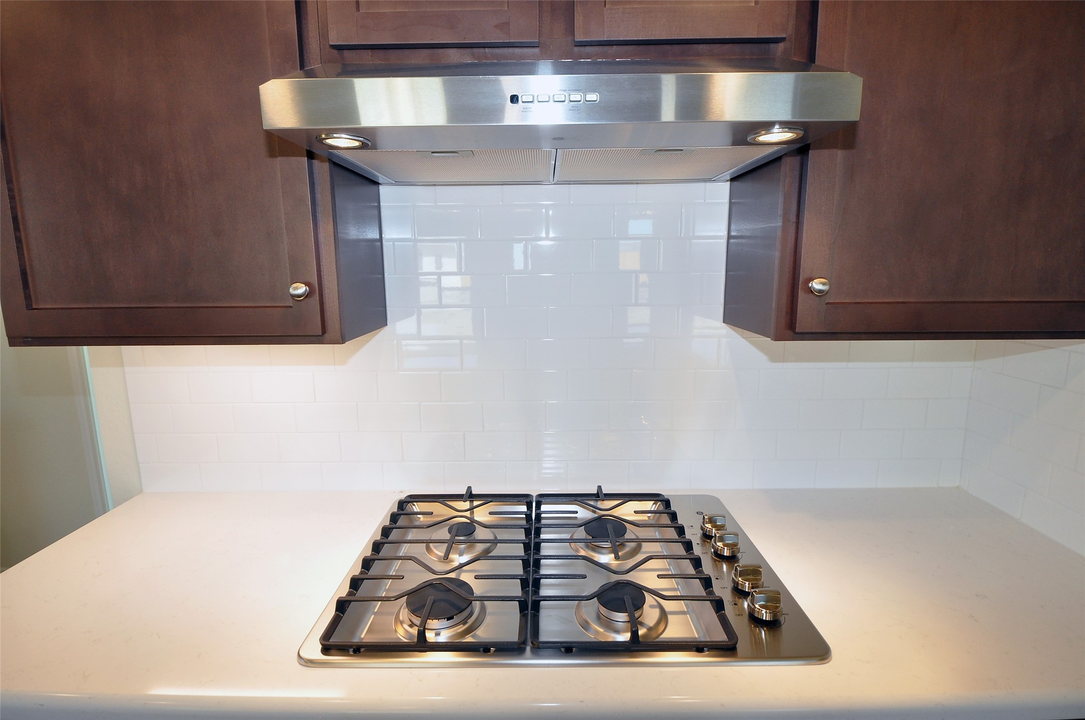 Gass cooktop directly vented to the outside.