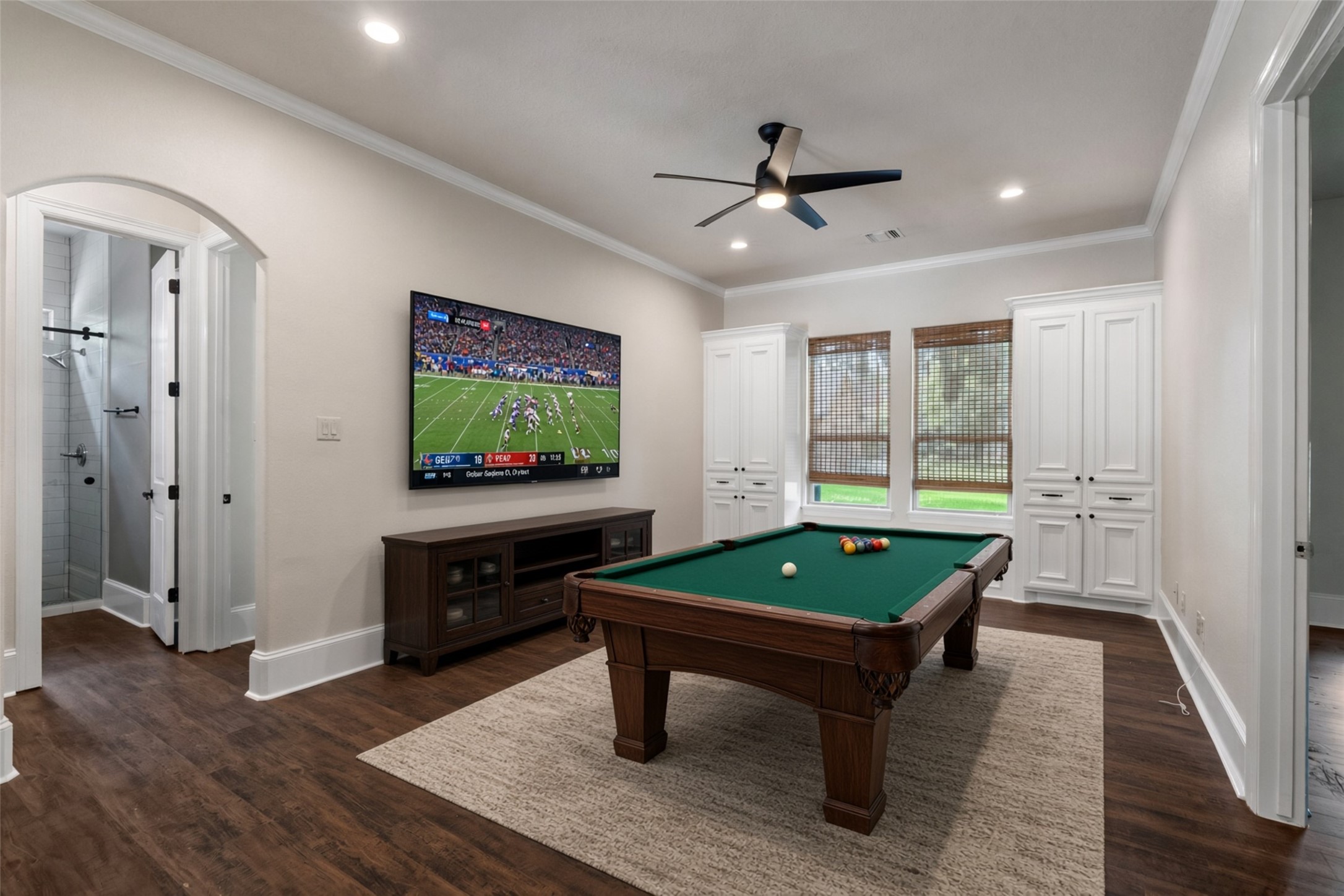 Gameroom downstairs with built-in storage *Vitually Staged*