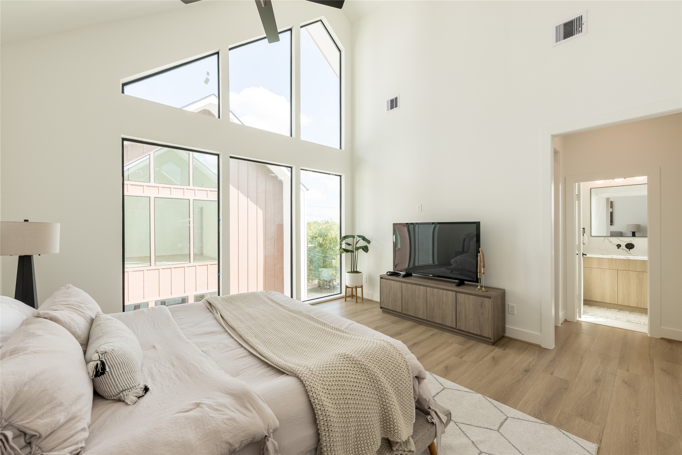Another view of primary bedroom