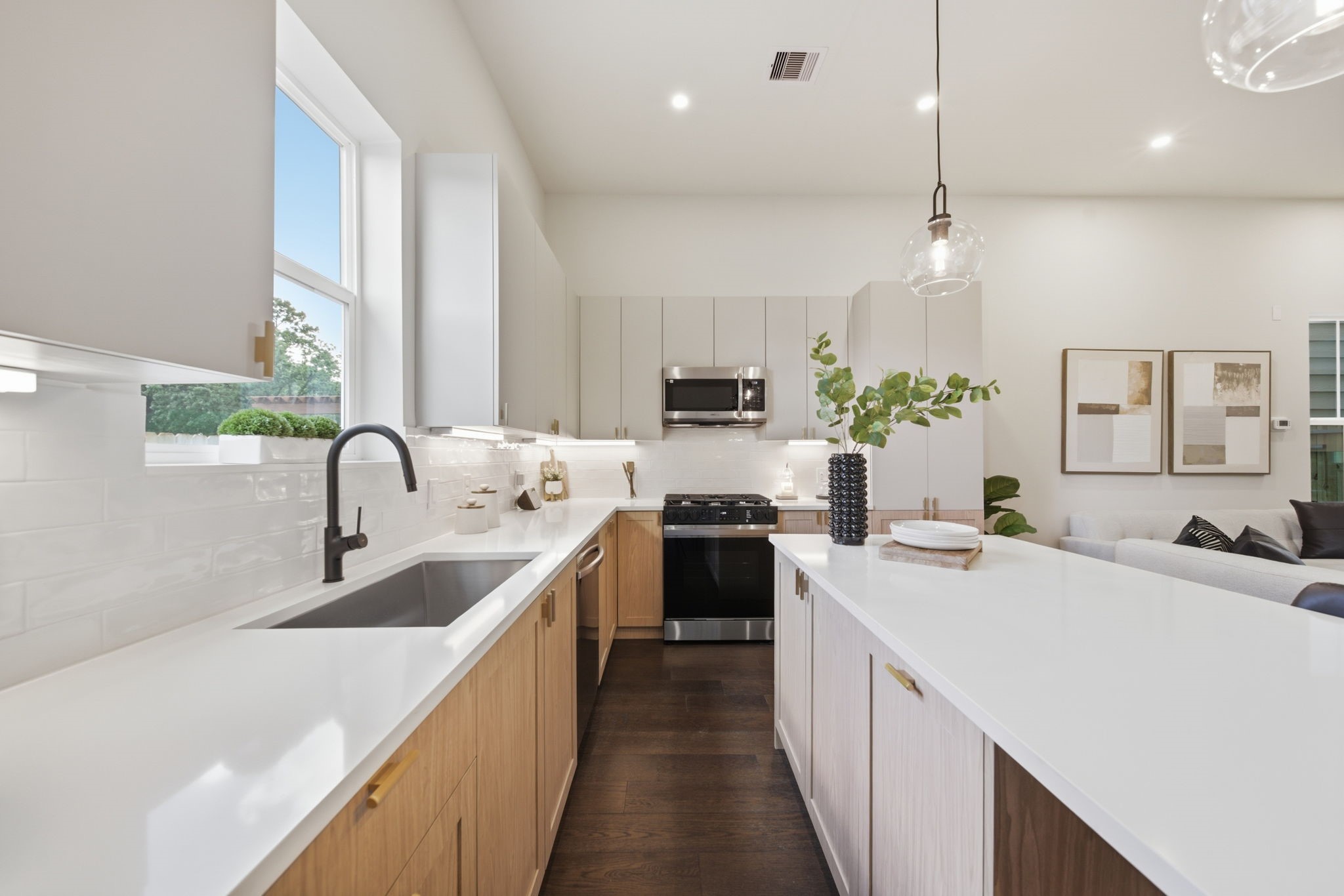 Kitchen equipped with premium fixtures and elegant cabinetry with lots of storage and stainless steel appliances