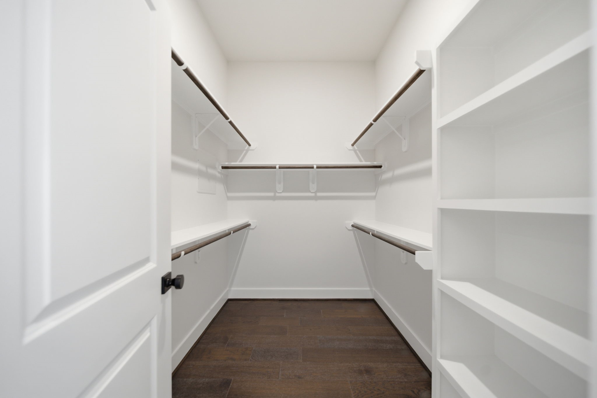 One closet in the primary bedroom and another in the attached primary bath