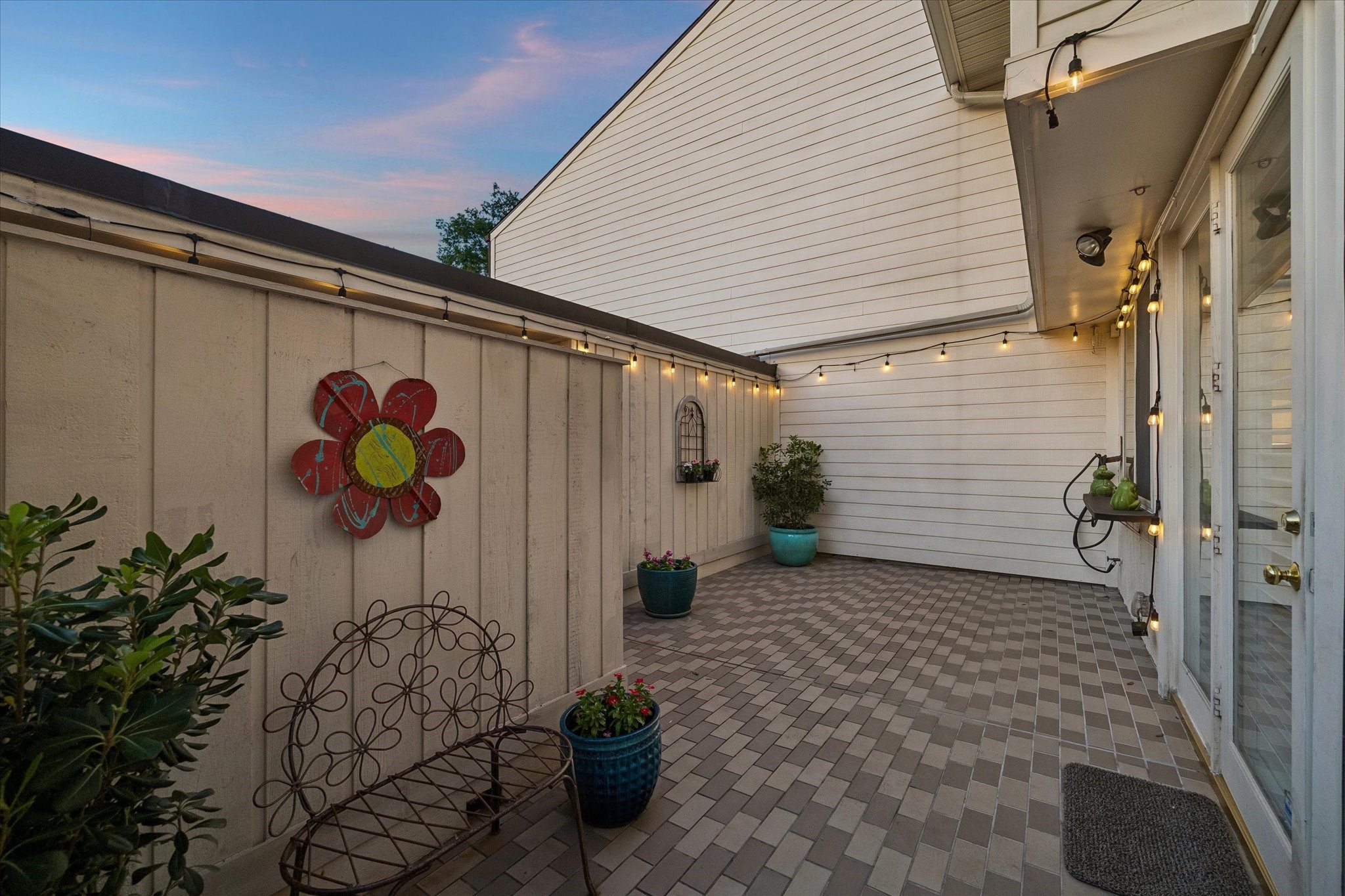Another view of the back Patio! How will you use this wonderful outdoor entertaining space? Maybe you'll add covered pergola with stylish outdoor furniture &/or your favorite outdoor grill space, or maybe a cozy Chimenea, lush greenery or what ever your heart delights! ENJOY MAKING IT YOUR OUTDOOR ESCAPE!
