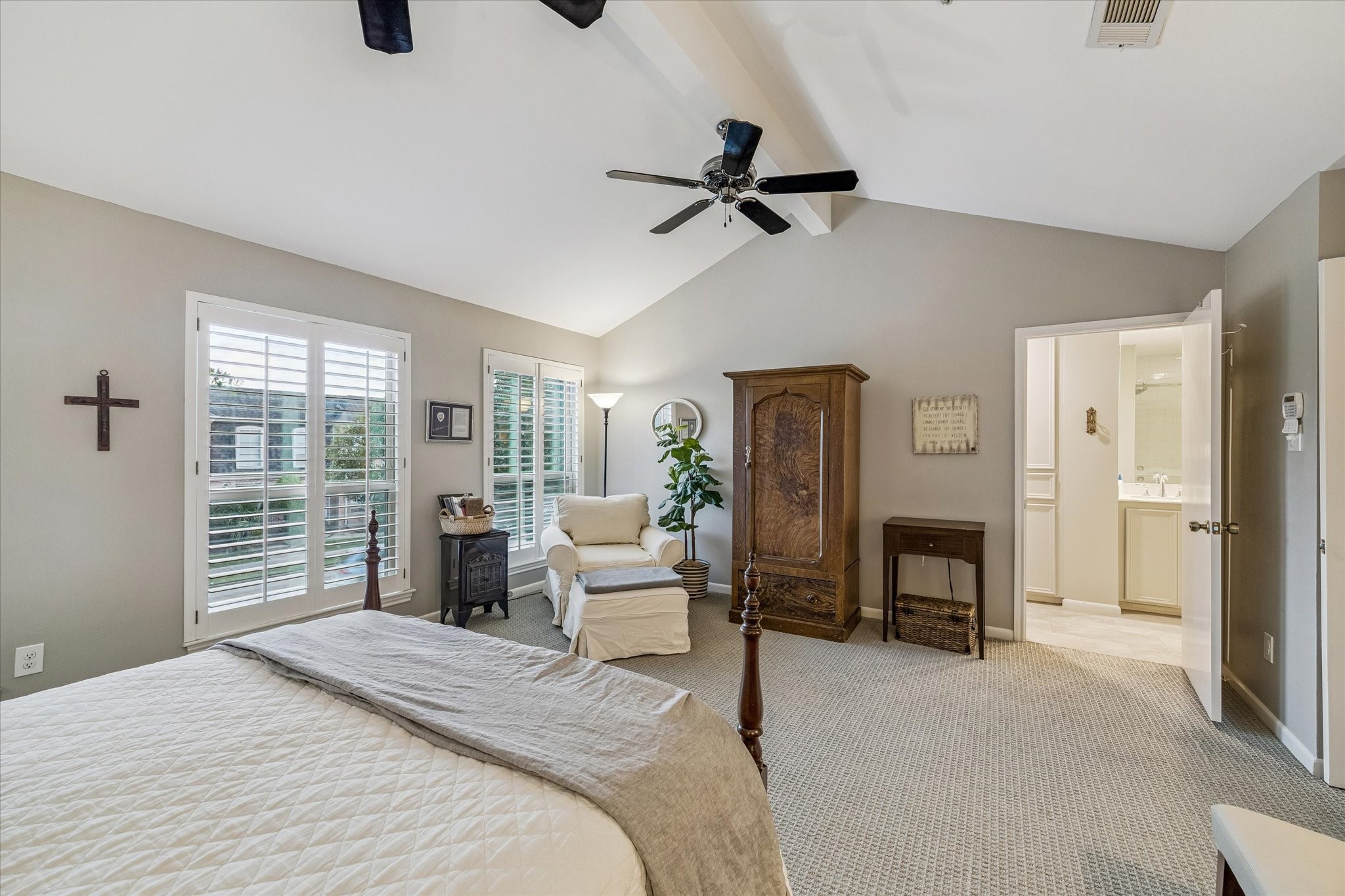 Another view of the lavish oversized Primary Retreat, boasting soaring ceilings and scenic tree-top views! NOTE all the extra space - ideal for having a separate sitting area w/ sofa, table & chairs, &/or that exercise bike, home office/desk or what ever you have always wanted in your Primary retreat! NICE!