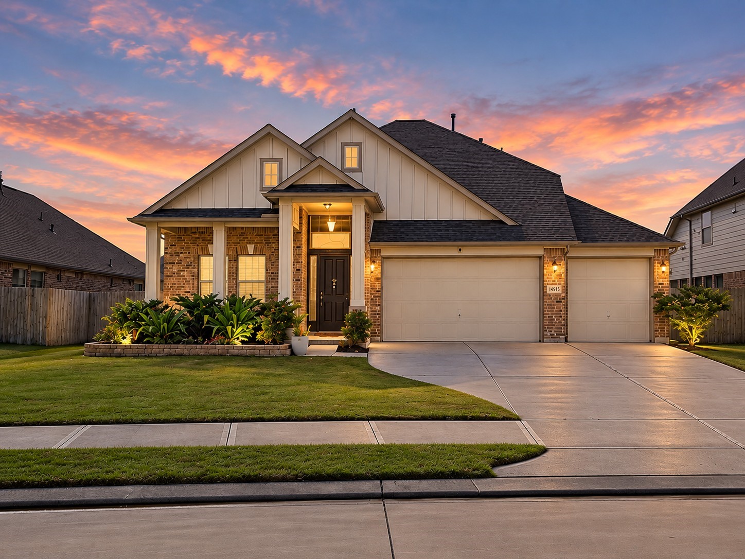Welcome to 14918 Lake Shore Ave in Mont Belvieus Lakes of Champions Estates, where classic brick charm and a welcoming covered porch set the tone for life at home.