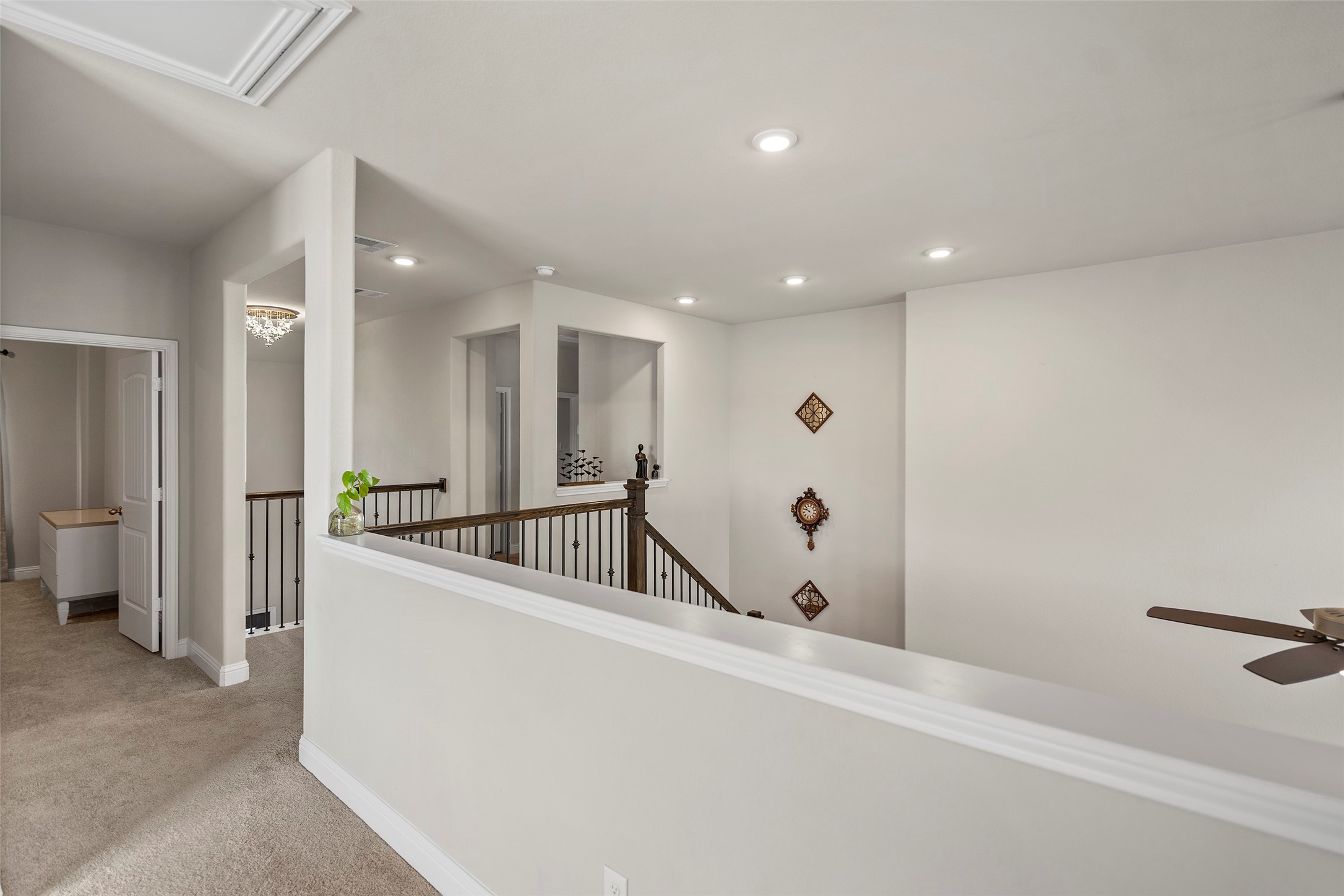 Open upstairs landing with views into the main living space.