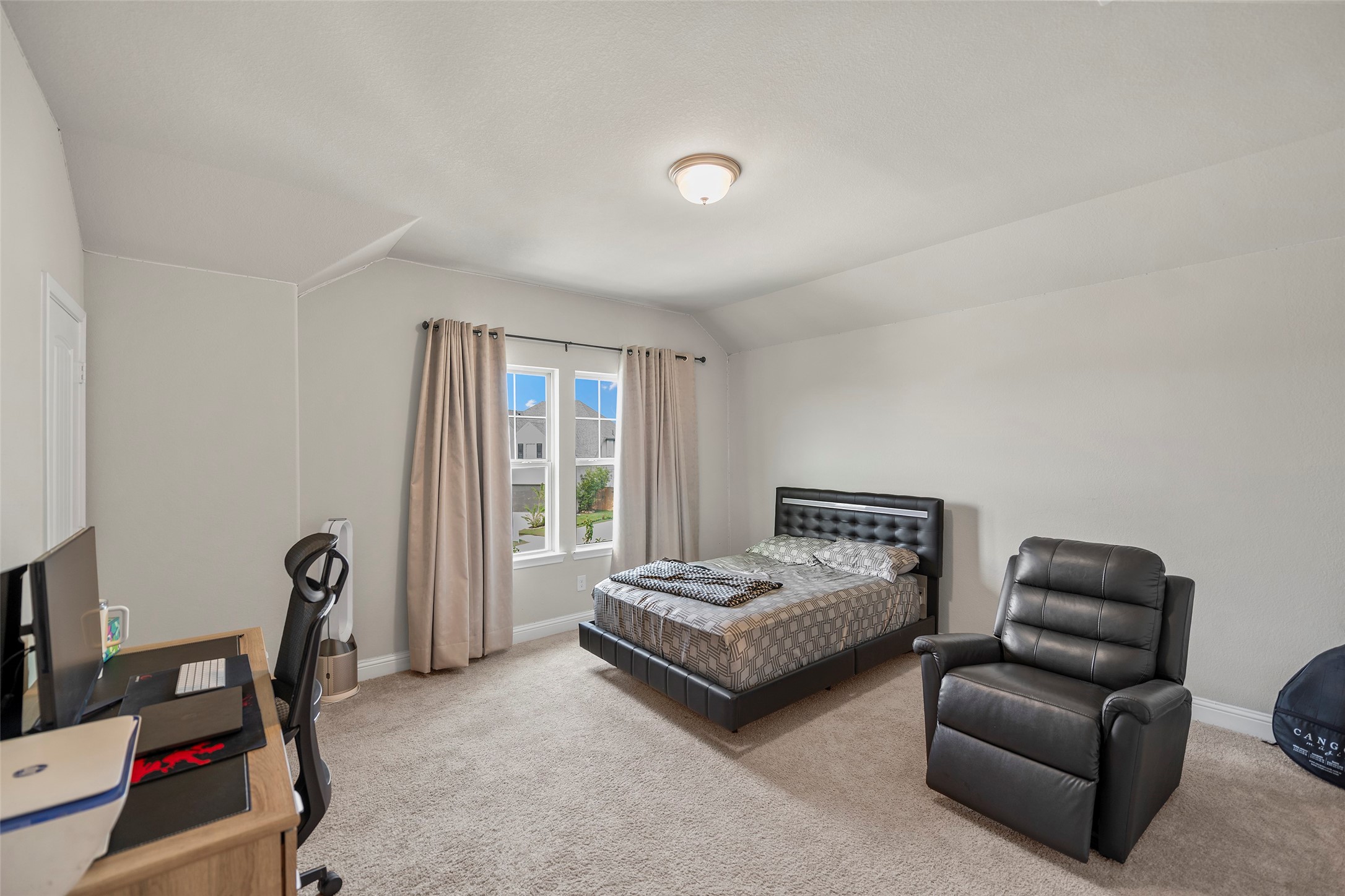 Spacious bedroom offering plenty of room for a flexible layout.