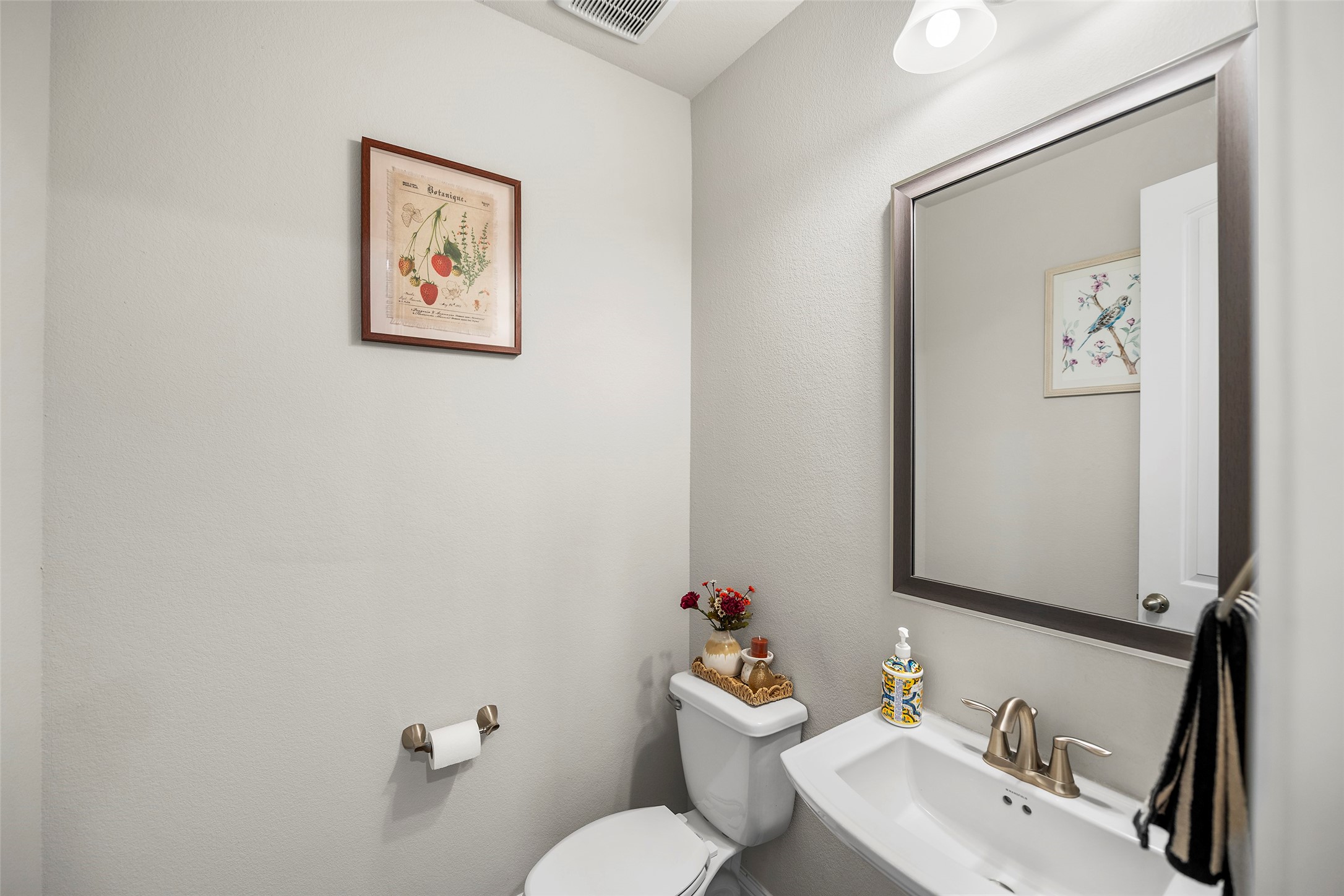 Half bathroom conveniently located on the main level.