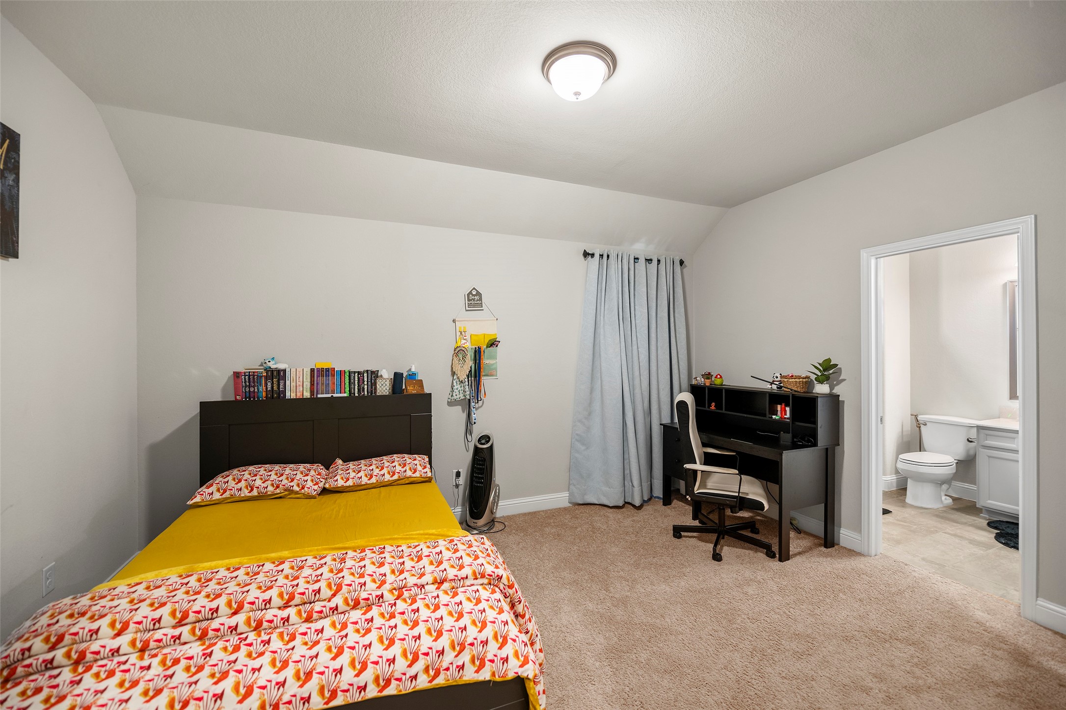 Additional bedroom with natural light and a spacious layout.
