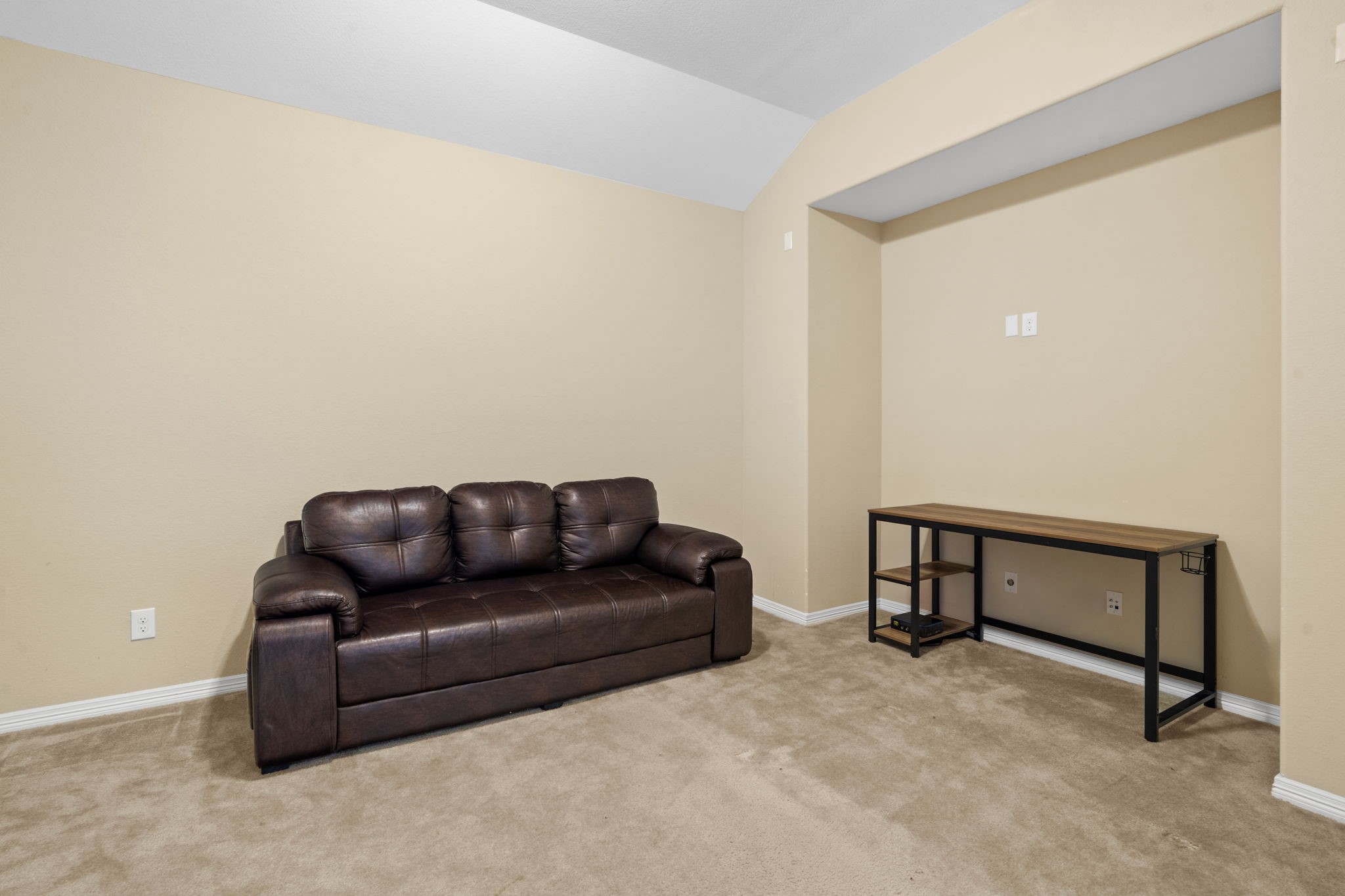 Versatile media room offers endless possibilities, whether used as a second home office, workout space, or tailored to fit your lifestyle.