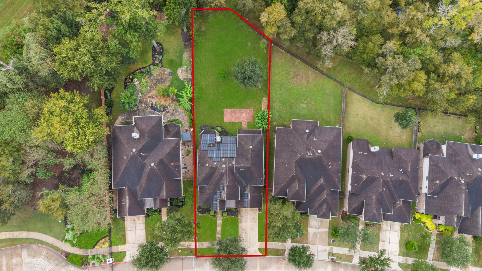 The generously sized lot stands out from neighboring properties, with plenty of room to add a pool.