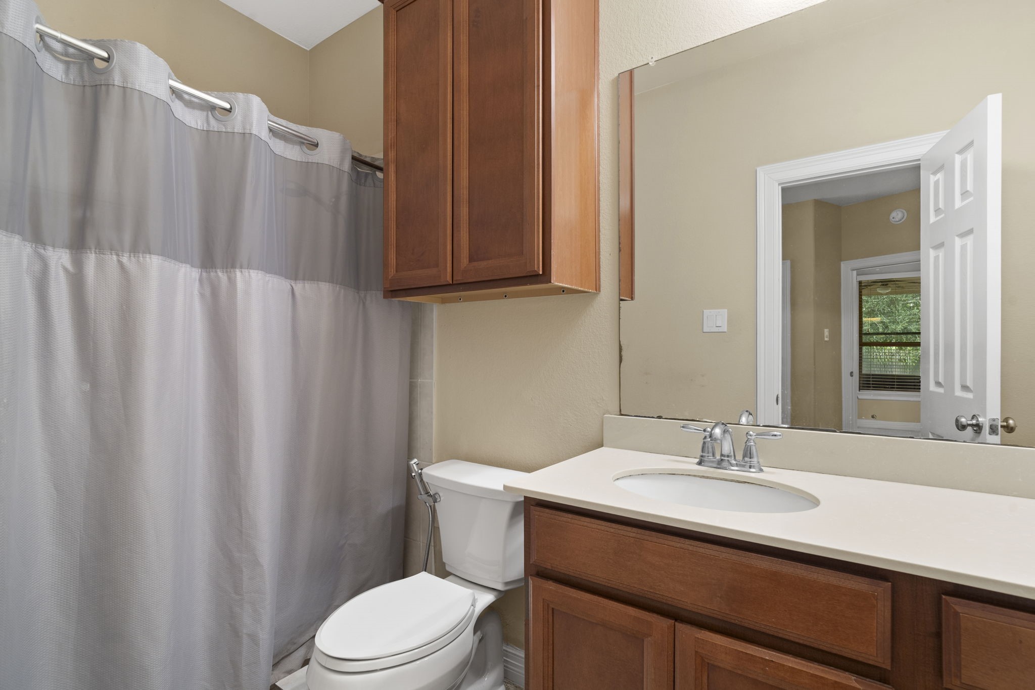 Full guest suite bathroom featuring a spacious walk-in shower.