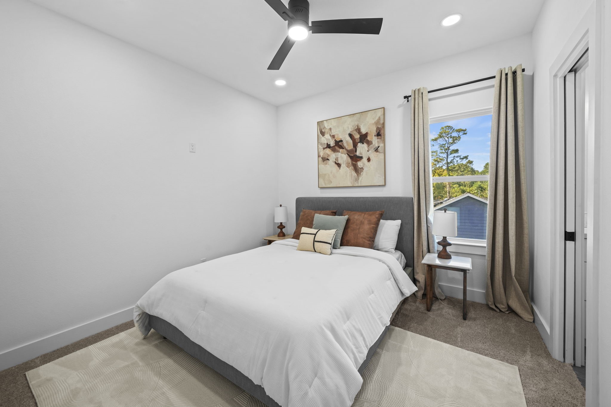 One of two secondary bedrooms on the second floor.