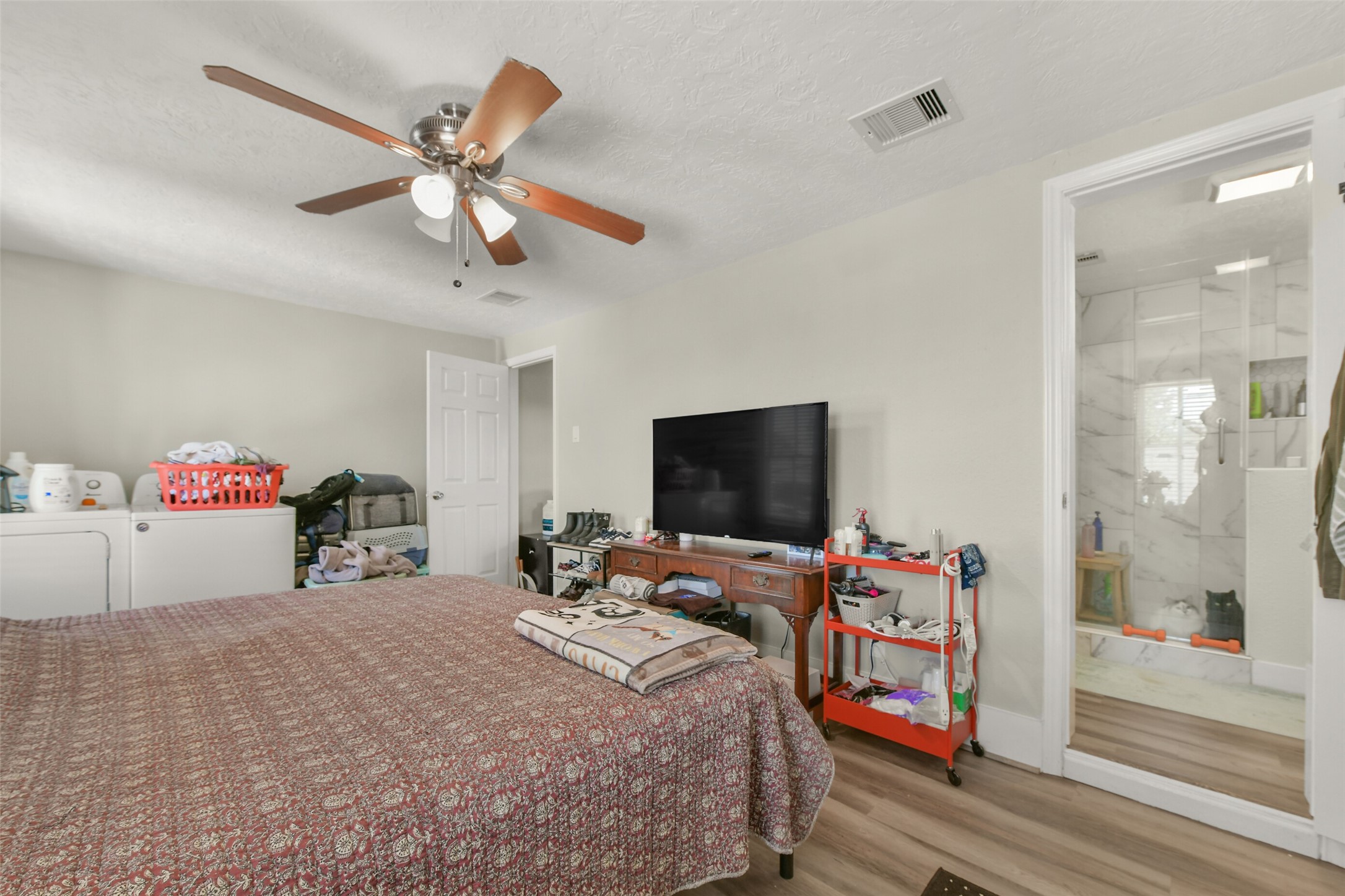 2nd floor bedroom with washer and dryer