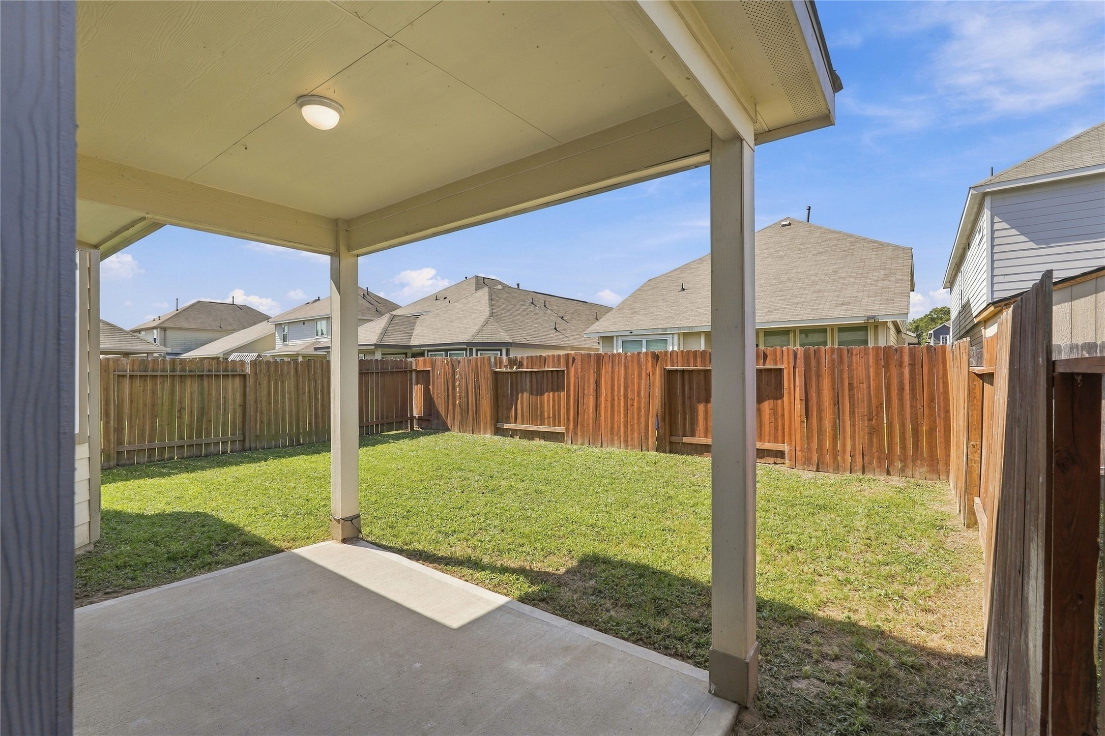 Covered Rear Patio with great yard size