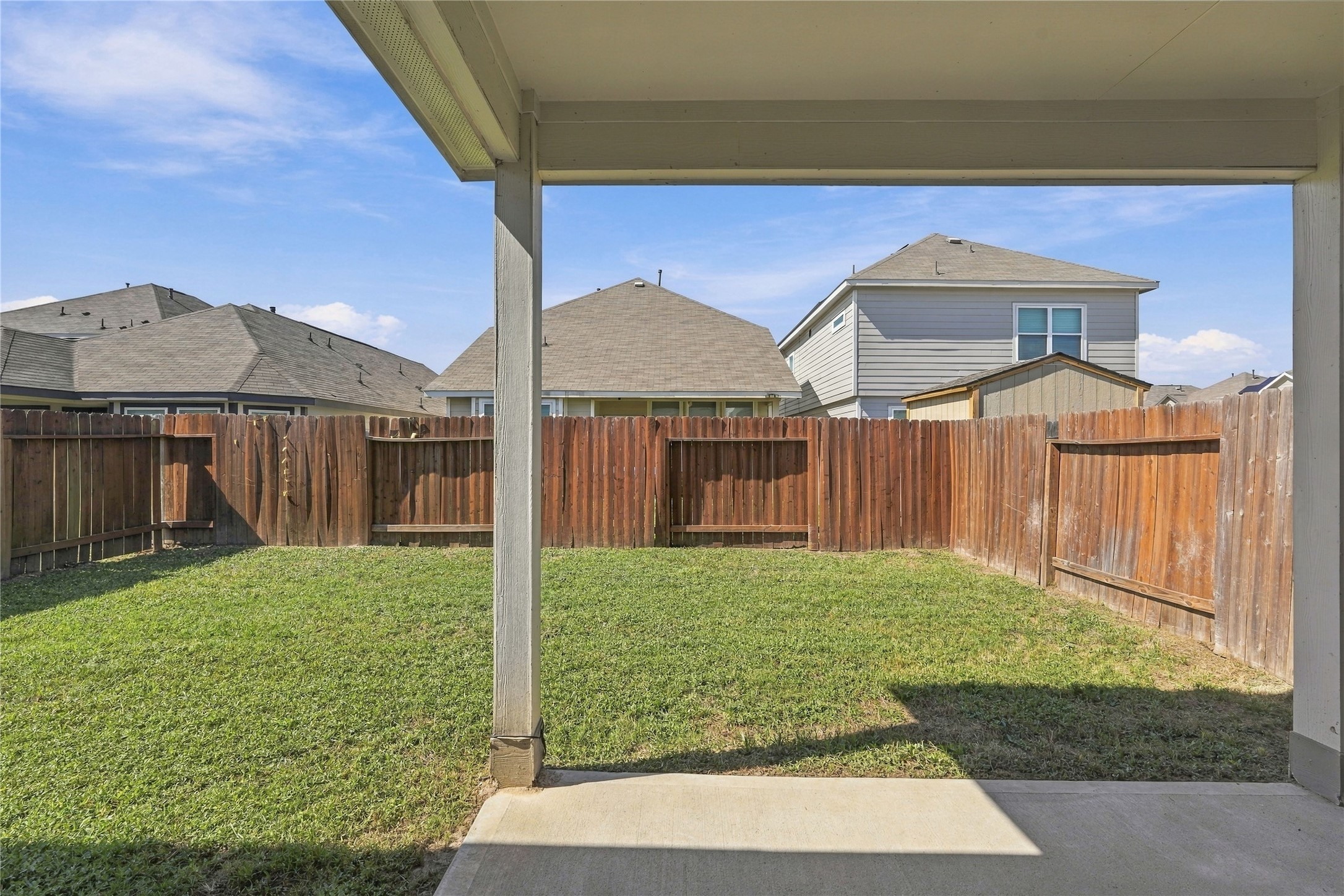 Covered Rear Patio with great yard size