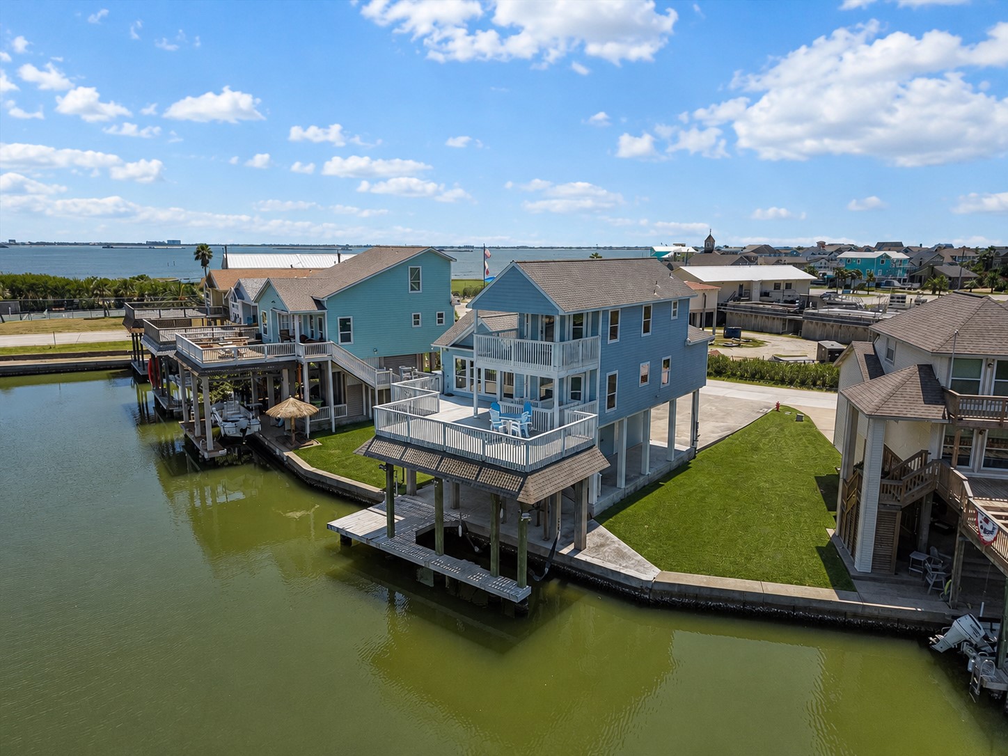 Experience elevated waterfront living in Tiki Island! This immaculately maintained coastal retreat welcomes you