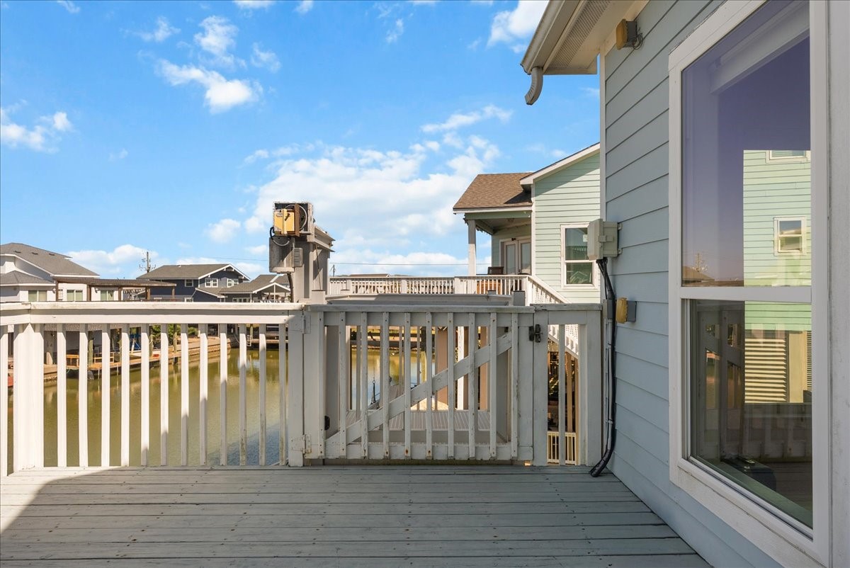 Enjoy an expansive deck, private boathouse, covered parking beneath the home, additional garage space, and exceptional outdoor livingall just a short walk from the neighborhood park.