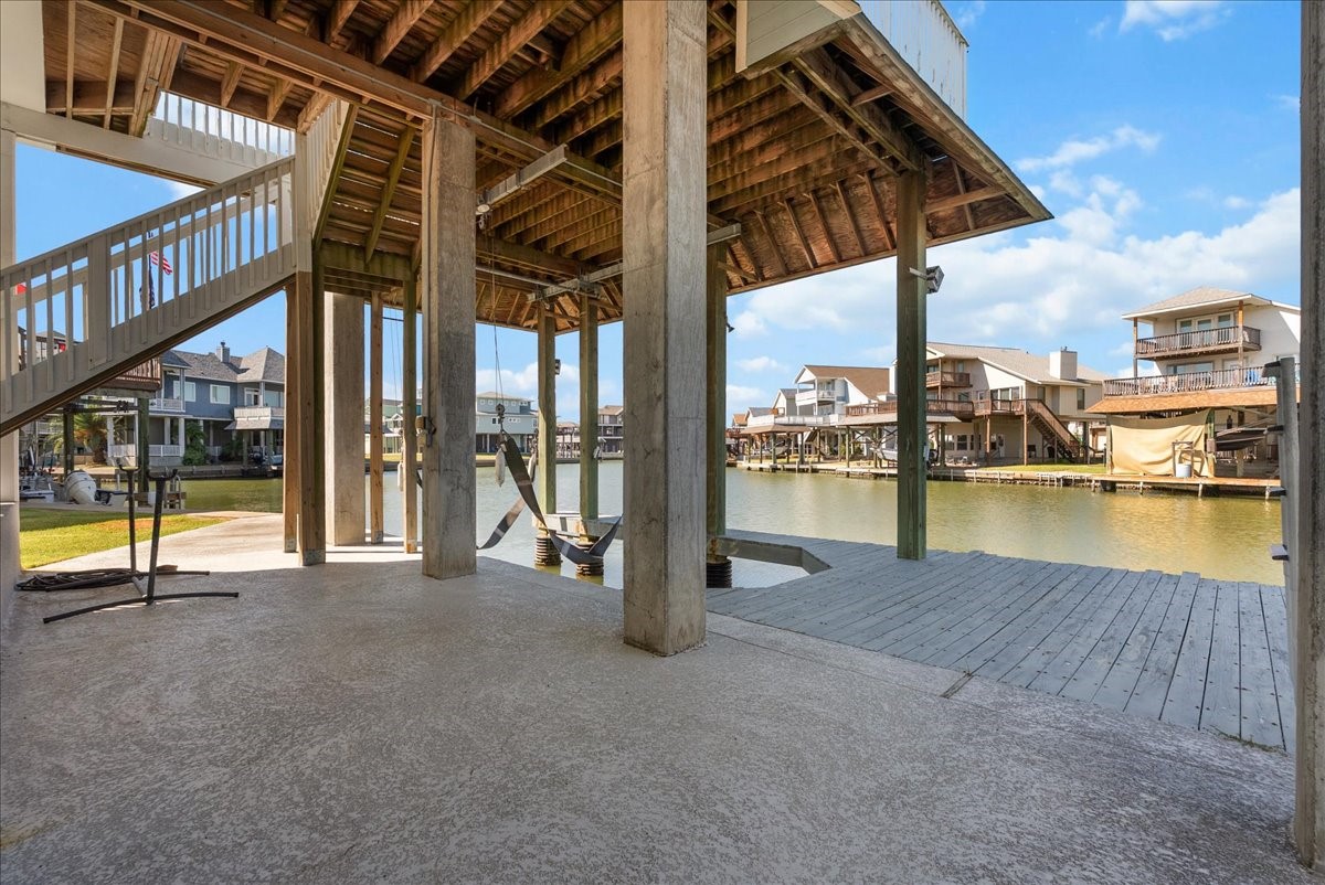 The private boathouse and expansive outdoor living space create the perfect setting for relaxing, entertaining, and enjoying the Tiki Island waterfront lifestyle.